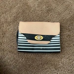 Black and pink striped hand bag